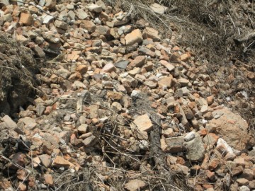 Scattered bricks in situ