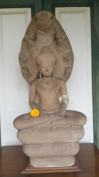 Crowned Buddha sheltered by a Naga (Lopburi Art) found at Wat Phra Ram