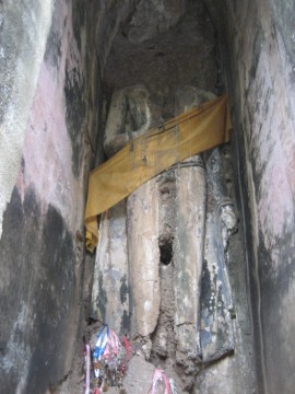 Standing Buddha image in portal